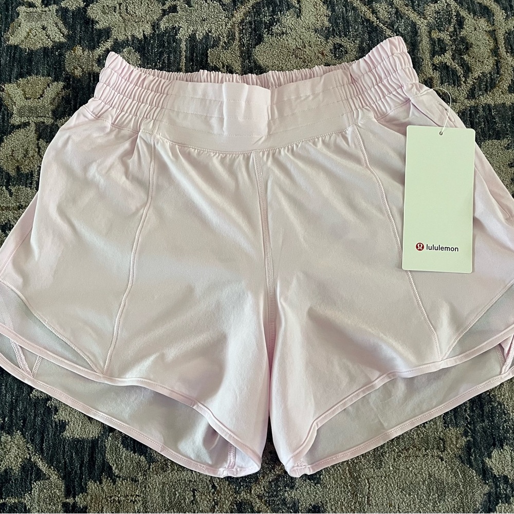 ***NWT*** Lululemon Hotty Hot HR short 4 in lined Pink.  Never worn, brand new!!